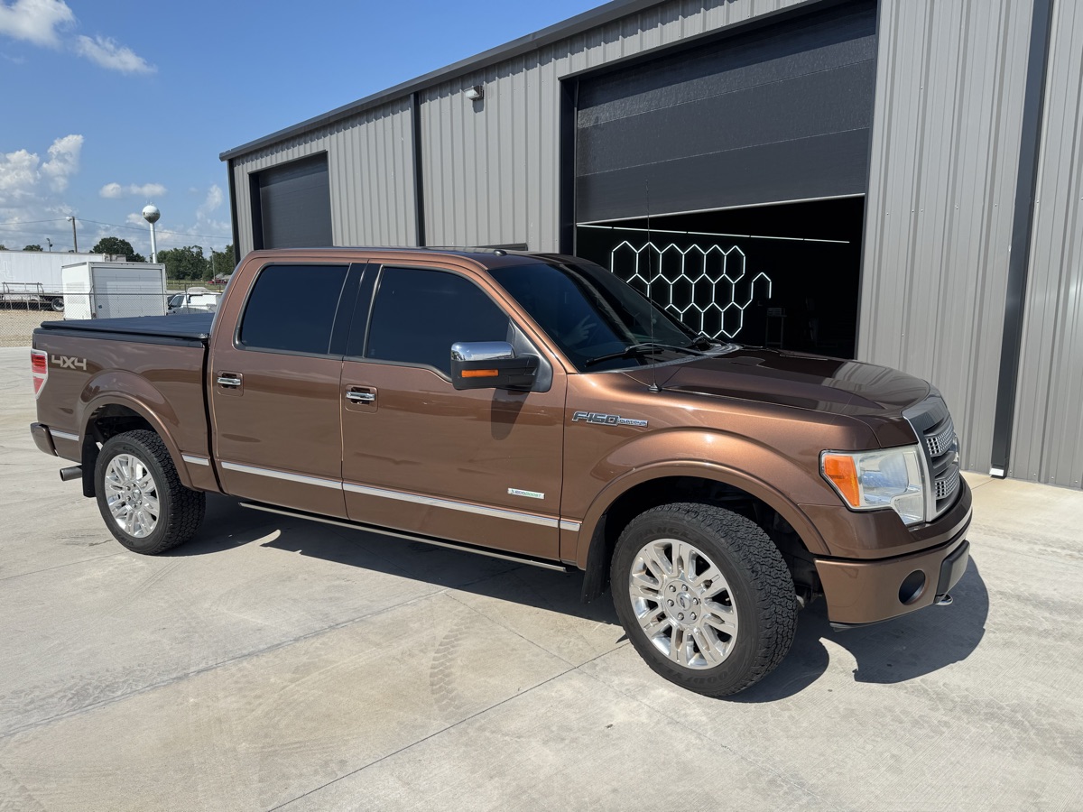 Copper Ford F-150 Platinum parked outside The Auto Film Studio