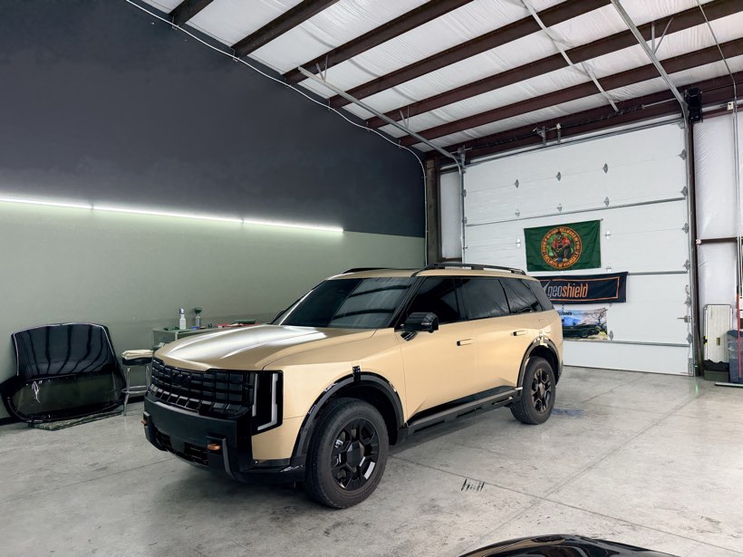 Kia Telluride in factory matte sand paint with fresh ceramic window tint